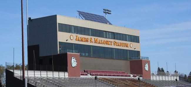A stadium with the words "University of Minnesota Duluth" and a bulldog head on the side.