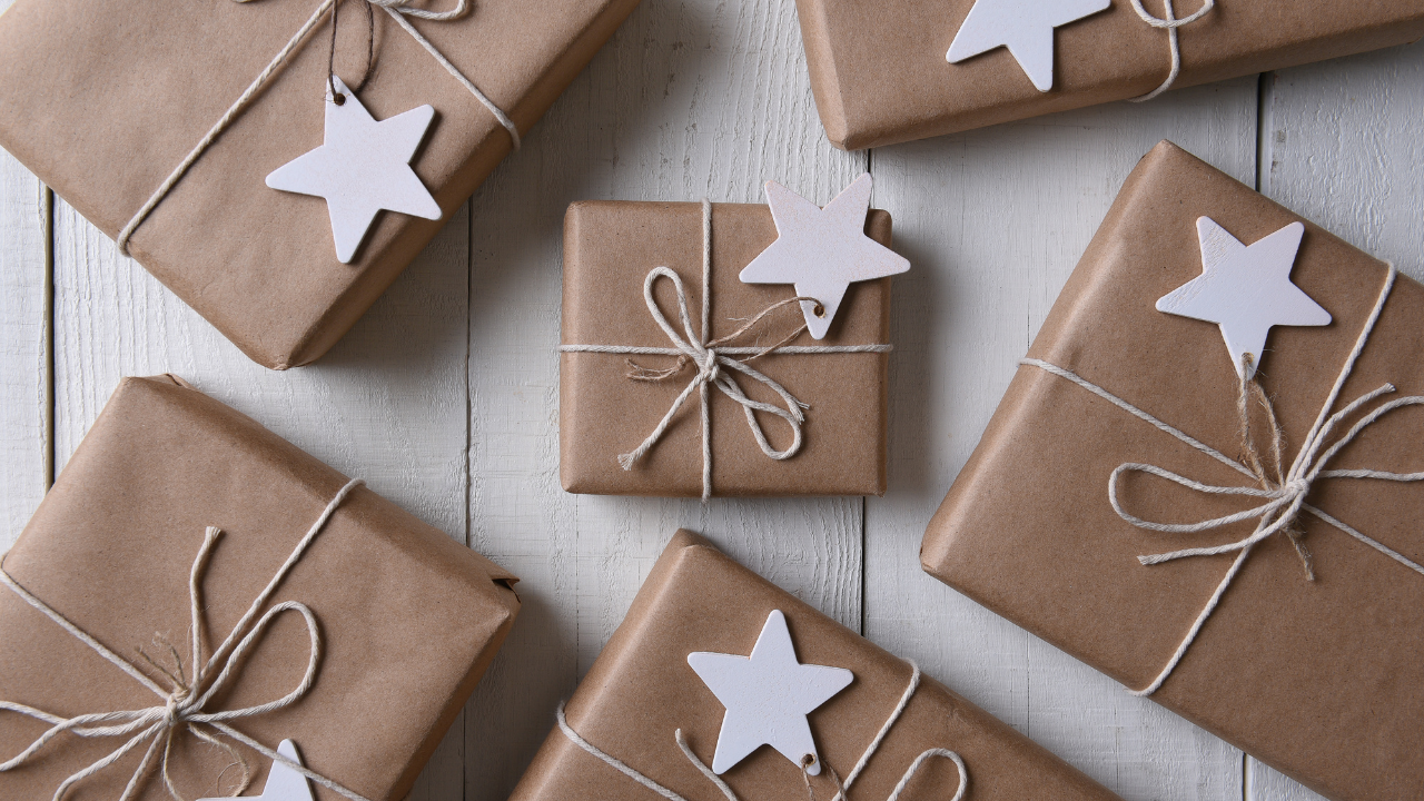 presents wrapped in paper bags with white stars on top